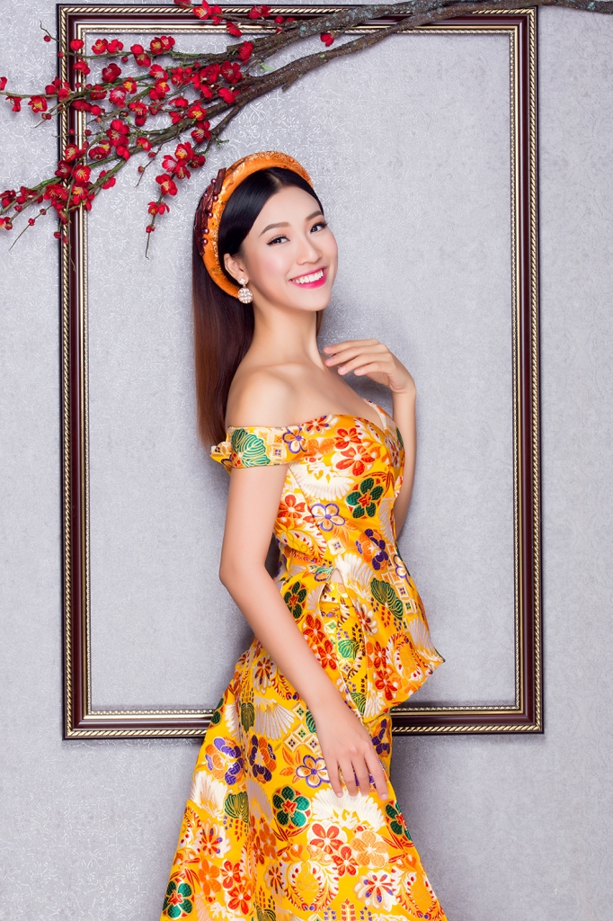 hoang oanh khoe da trang ngan voi trang phuc tu vai gam