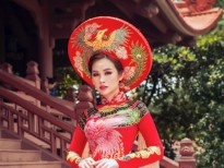 Á hậu Thanh Trang diện áo dài lấy ý tưởng từ hoa sen, long phụng của NTK Tommy Nguyễn