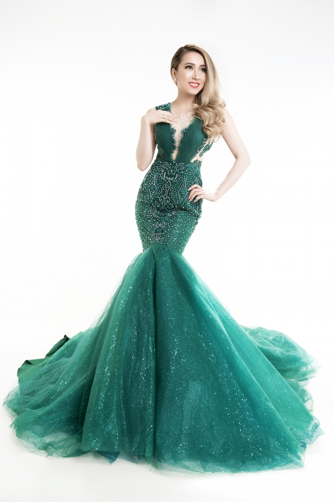 tina ngoc nu giong ca bolero dien dam ren khoe than hinh nong bong