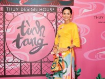 Tóc tém đánh keo, áo dài vàng hoa sen, Hoa hậu H'Hen Niê nổi bật trong sự kiện thời trang