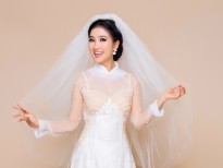 'Nữ hoàng phim xưa' Quỳnh Lam rạng rỡ với áo dài cưới ren nổi 3D