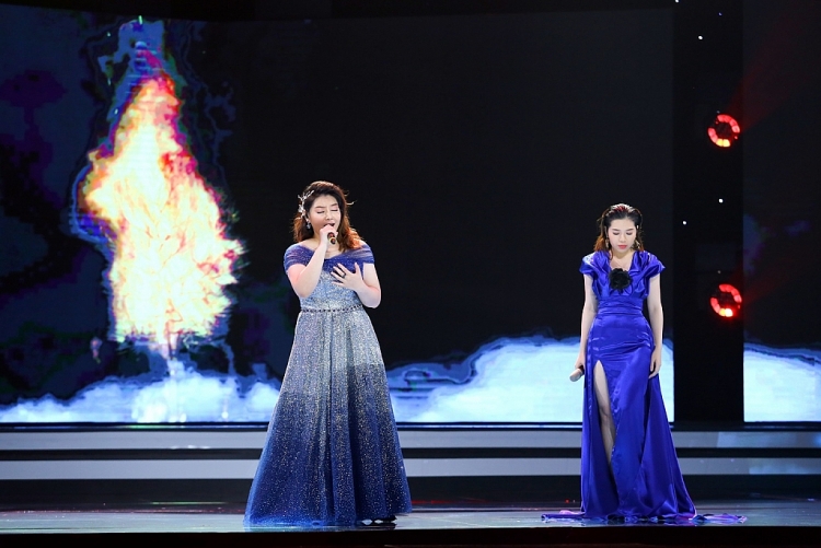 Xuân Nghi tiết lộ Quang Dũng là ca sĩ nổi tiếng đầu tiên mà cô được hát song ca